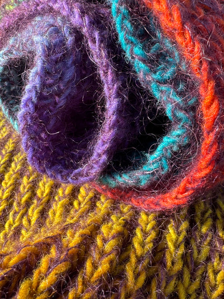 fargespill skjerfet, nærbildet